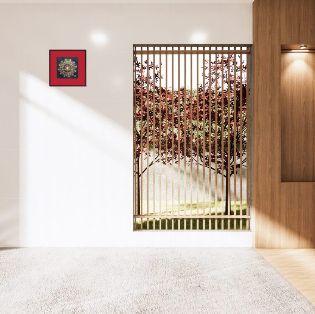 玄関の格子戸の横、白い壁に飾られた曼荼羅。外からの厄を払い、福を招く。